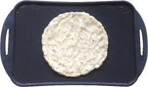 cauliflower pizza dough on tray